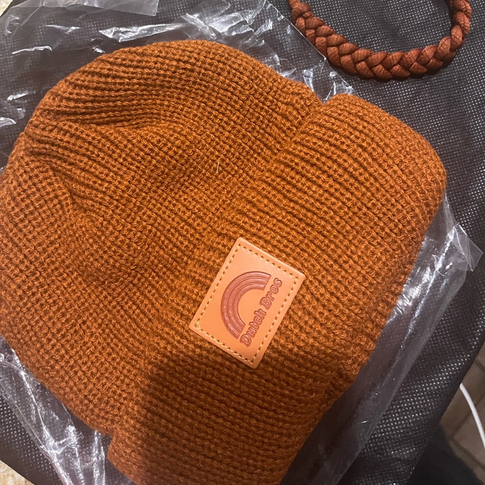 Never worn brown dutch bros beanie plus matching bracelet